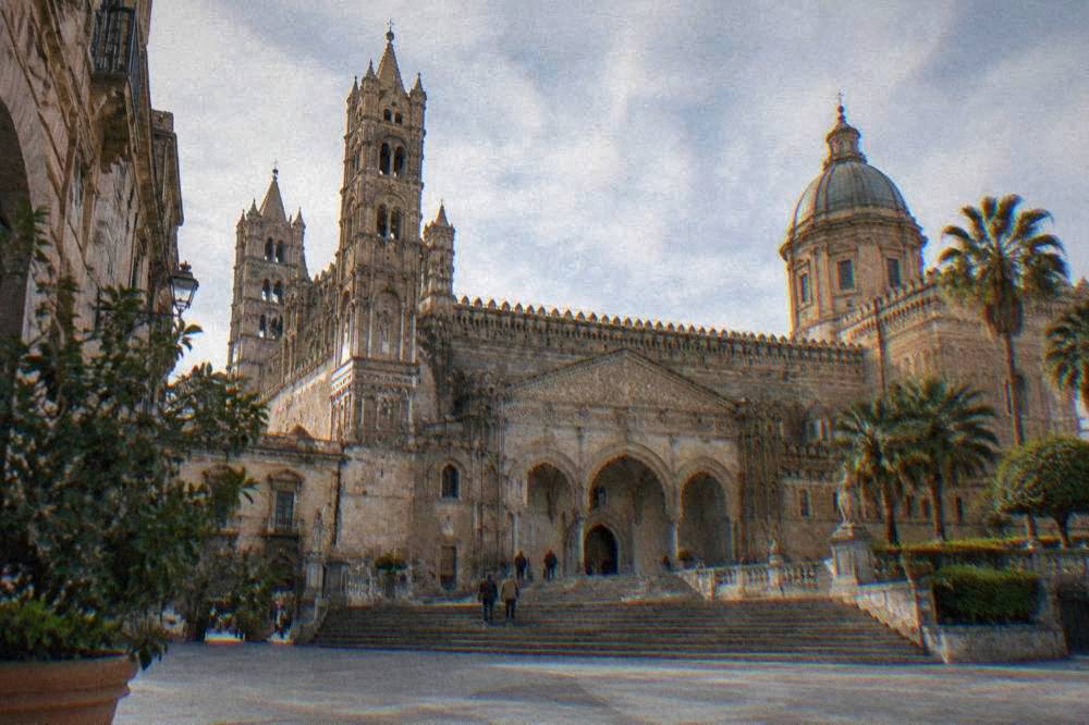 The exterior of Palermo Cathedral with its towers and wide staircase