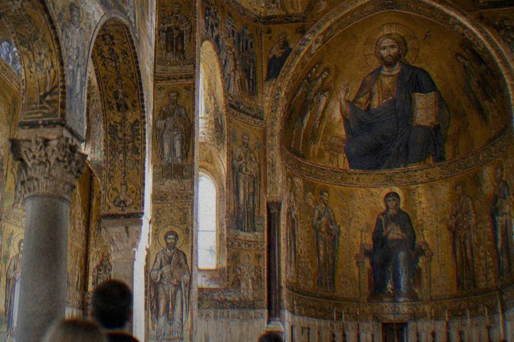 Close view of the gold mosaic sanctuary of the Palatine Chapel showing biblical figures