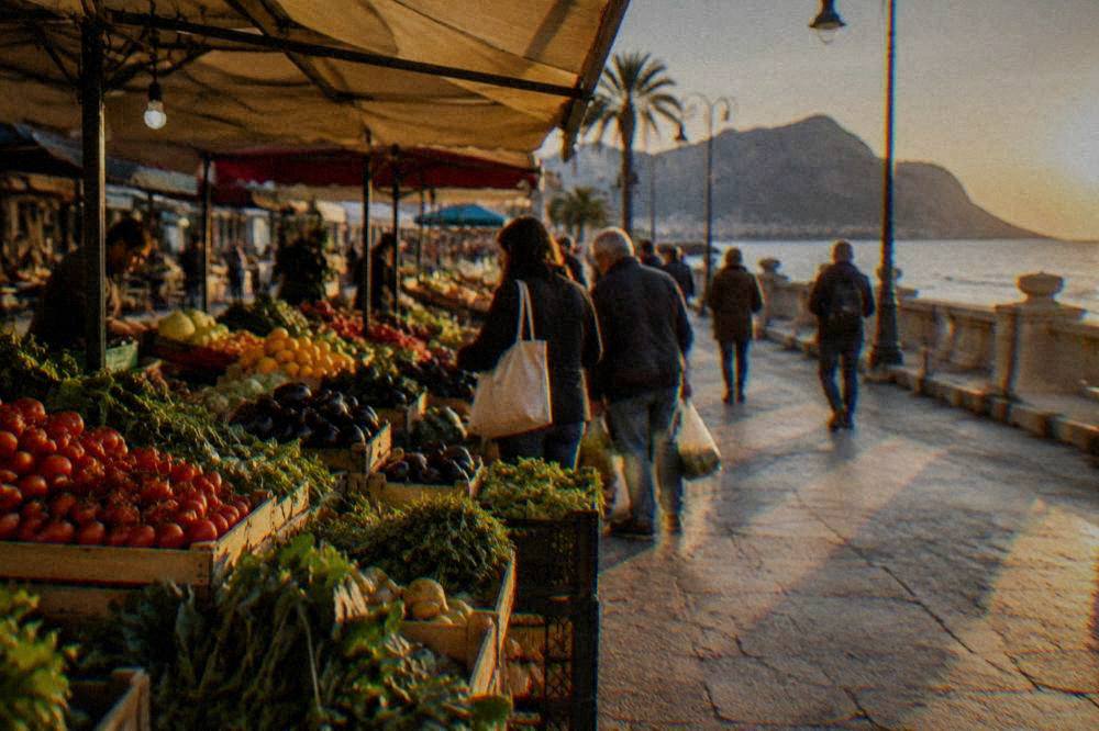 A busy Palermo street market stall with stacked produce and shoppers browsing