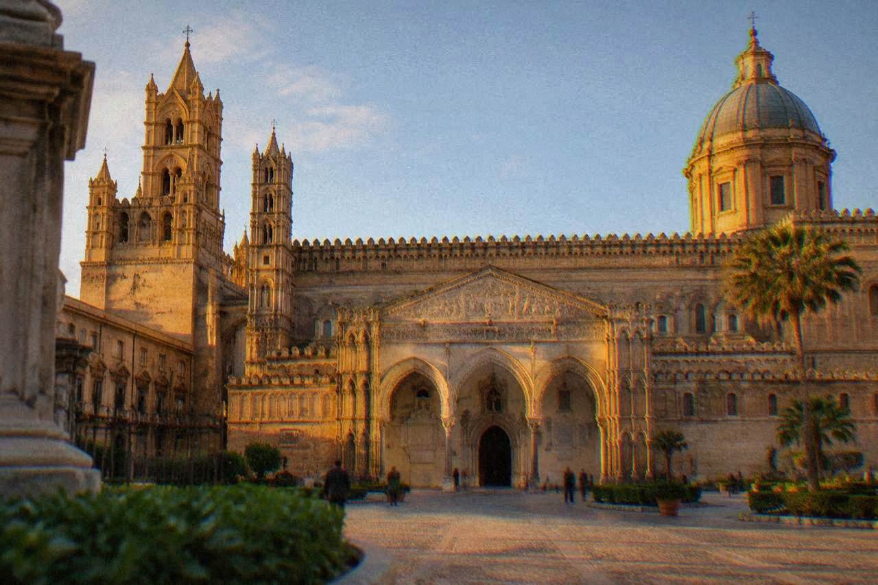 The west front of Palermo Cathedral seen from the square in warm afternoon light