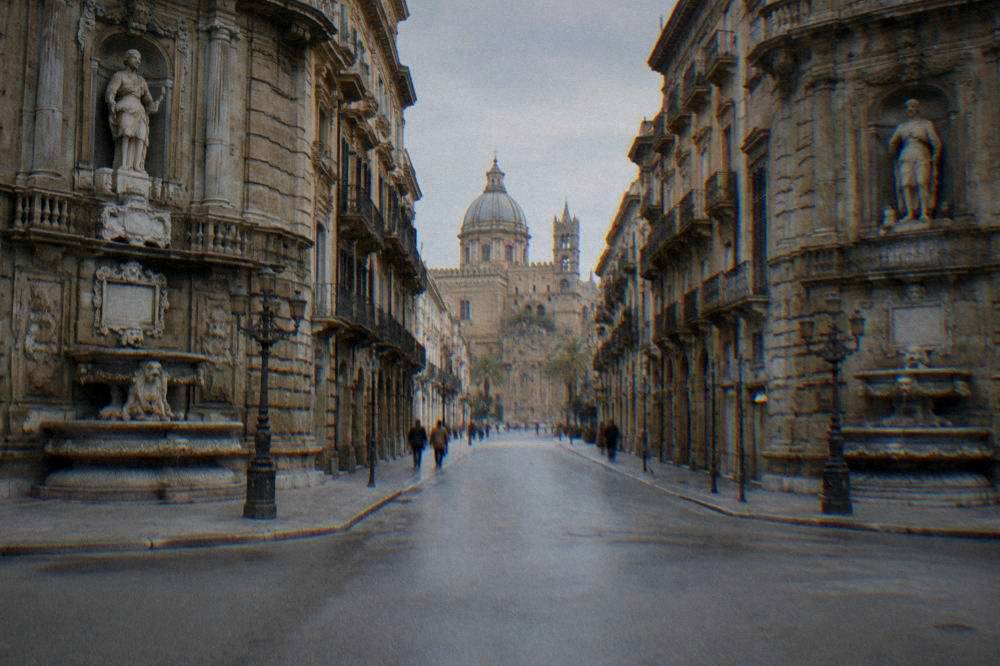 The Corso Vittorio Emanuele street leading away from the Quattro Canti toward the Palermo cathedral