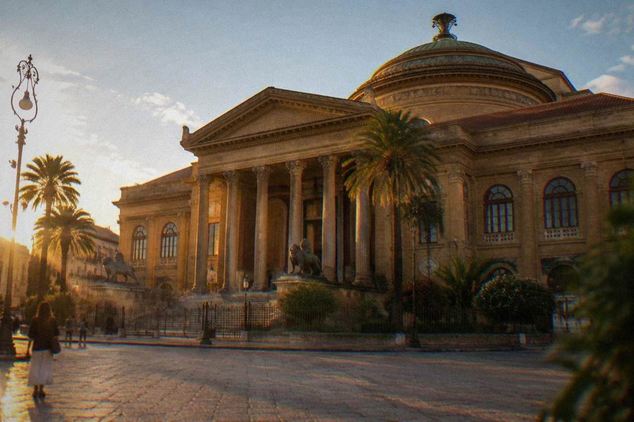 The exterior of the Teatro Massimo opera house in Palermo seen from the square in front of it