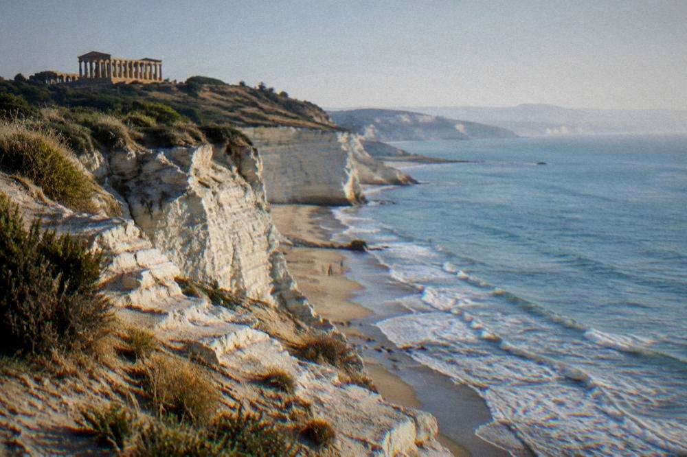 White limestone cliff above a sandy beach on the Agrigento coast