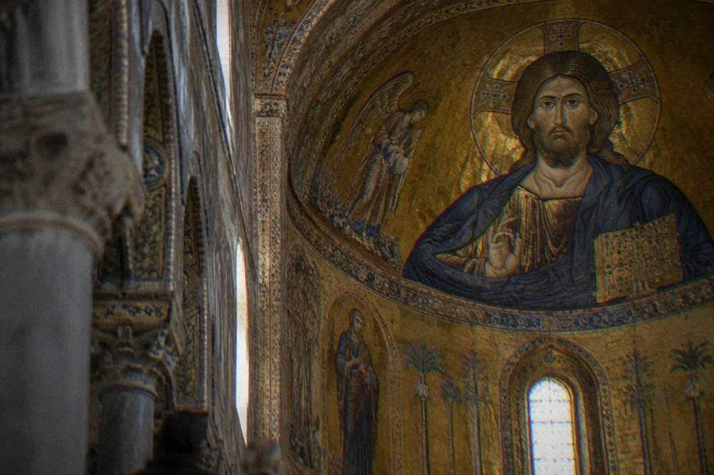 Detail of a gold mosaic figure in the apse of Monreale Cathedral