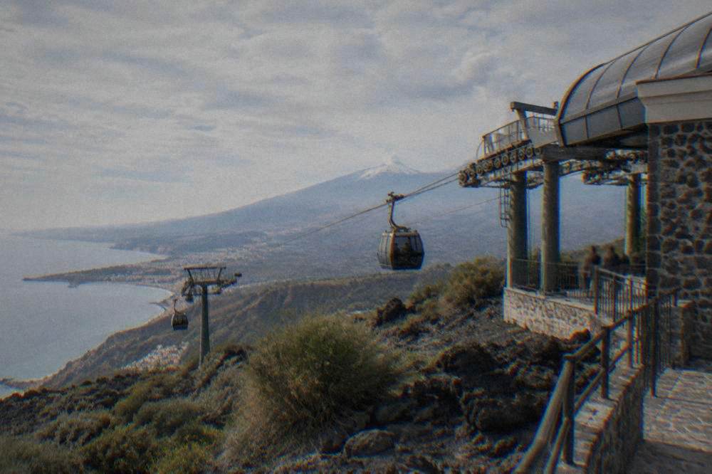 Cable car station on the dark volcanic slopes of Mount Etna