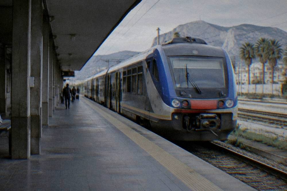 A regional train at Palermo Centrale station platform