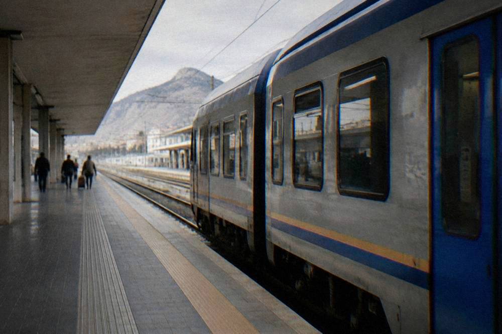 A regional train at a platform inside Palermo Centrale railway station