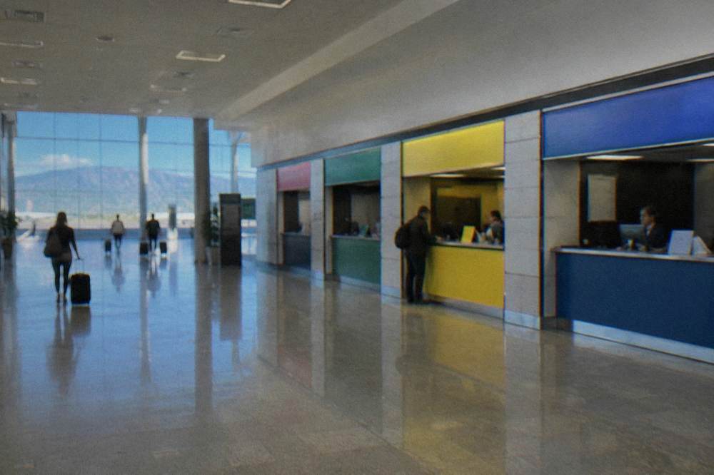 Rental car counters in the arrivals hall of Palermo Airport