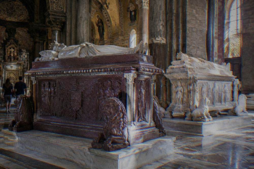 Porphyry and marble royal tombs inside the chapel of the royal tombs in Palermo Cathedral
