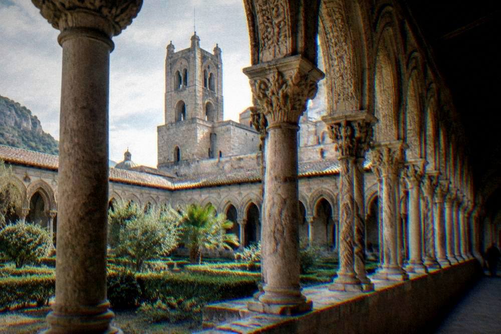 Monreale cloister arches with stone columns on a calm winter morning