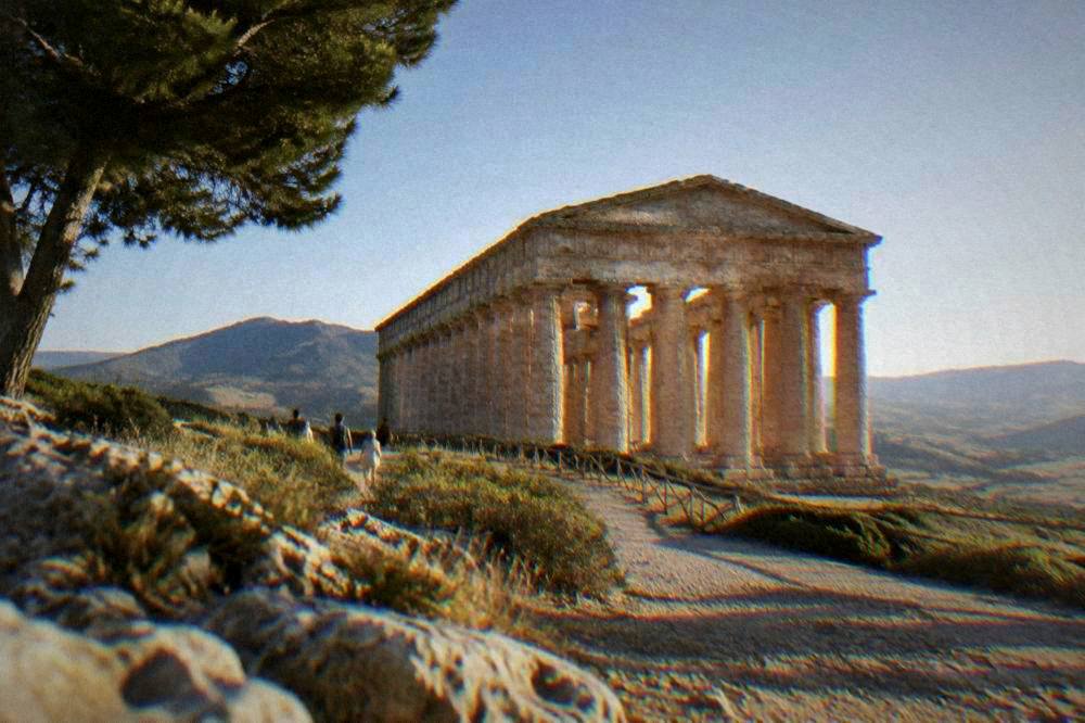 The ancient Greek temple at Segesta standing on a hillside under a clear sky