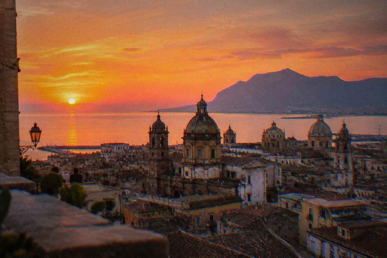 Evening view over the rooftops and church domes of central Palermo