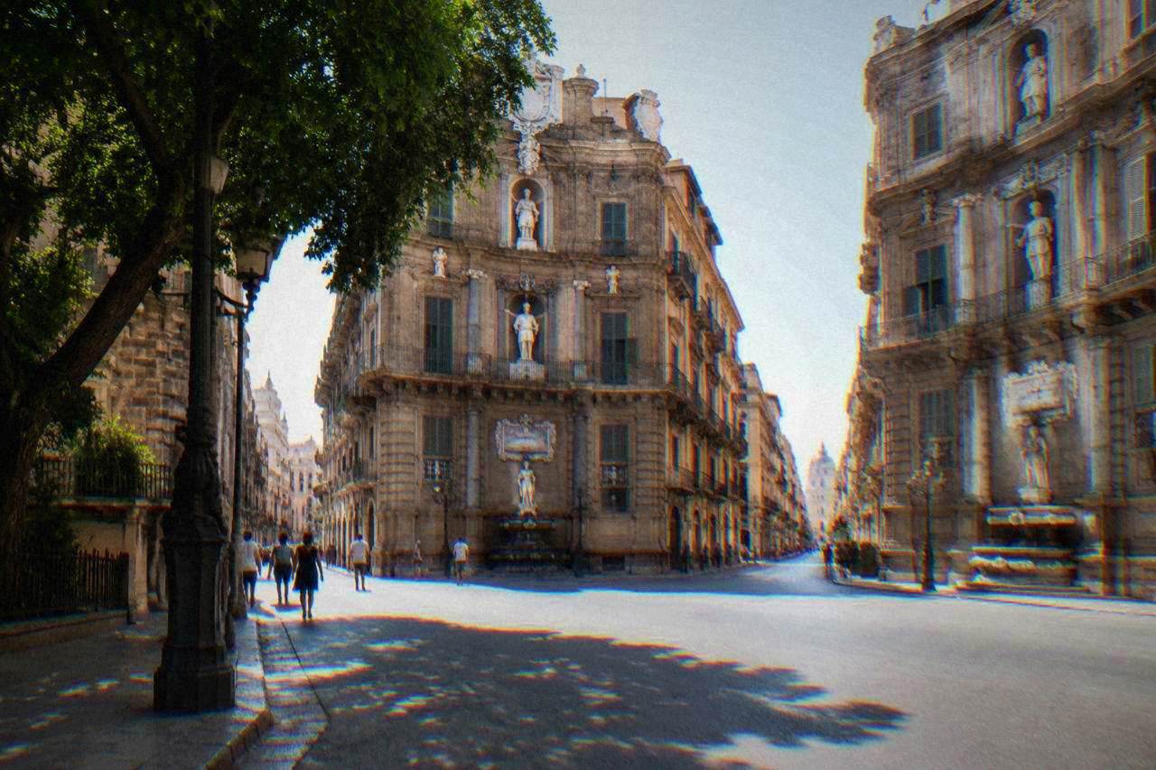 Morning light on the ornate facades at the Quattro Canti crossroads in Palermo