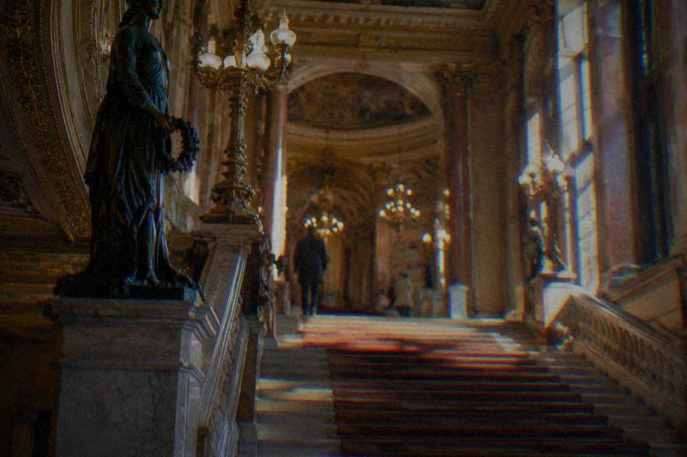 The grand staircase and gilded interior of the Teatro Massimo opera house