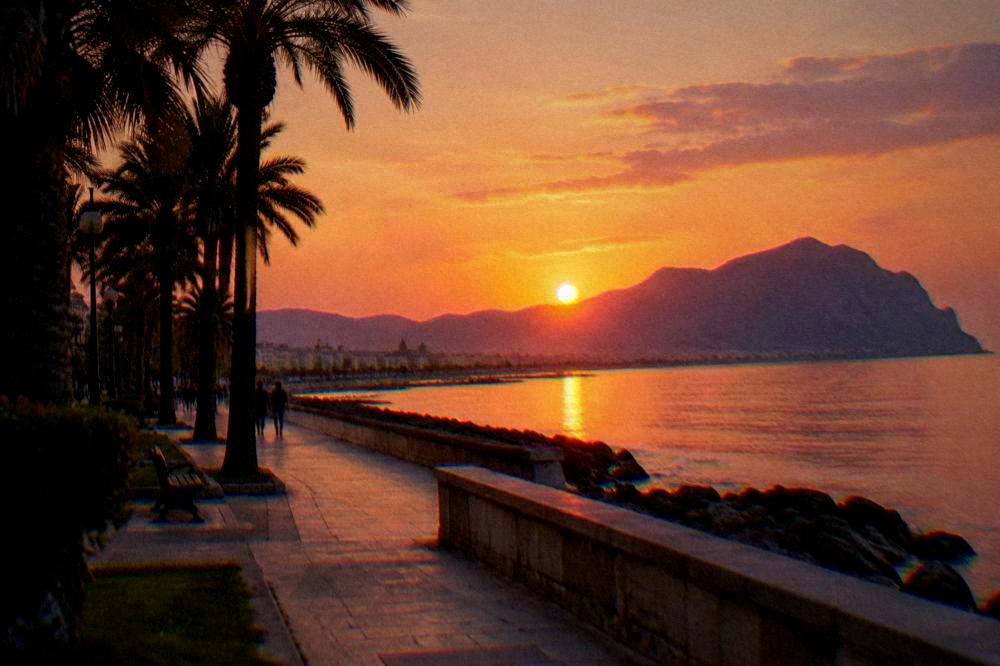 Evening light on the Foro Italico seafront with palm trees and the Tyrrhenian Sea